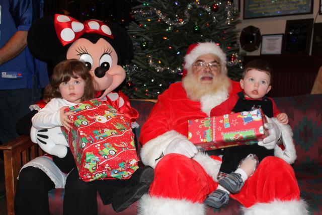 Children's Christmas Party at 8-100. 12-9-2012. Santa pays a visit . Photo by Vincent P. Tuzzolino